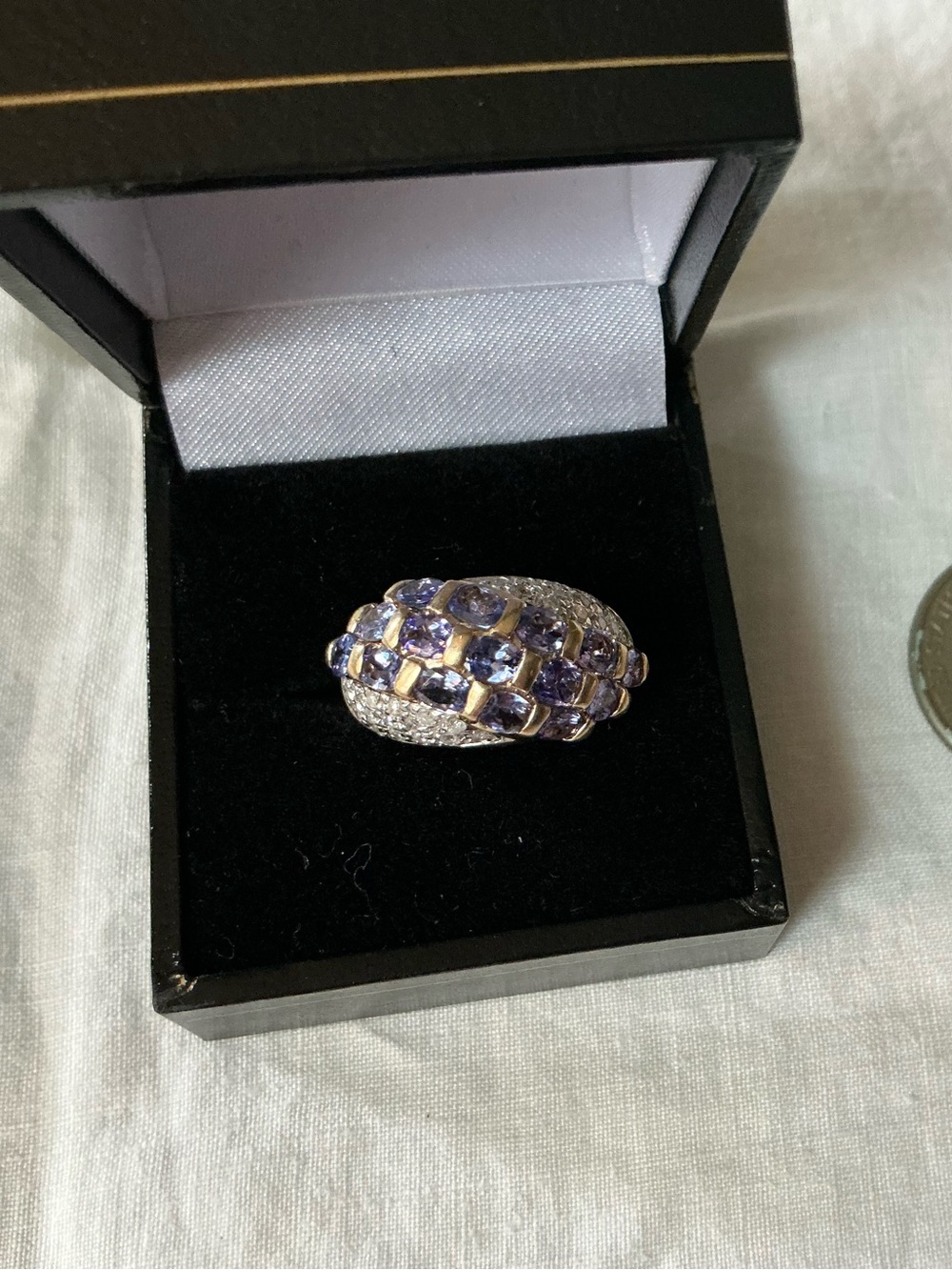 Elegant 14kt yellow gold tanzanite and diamond ring (135-15)